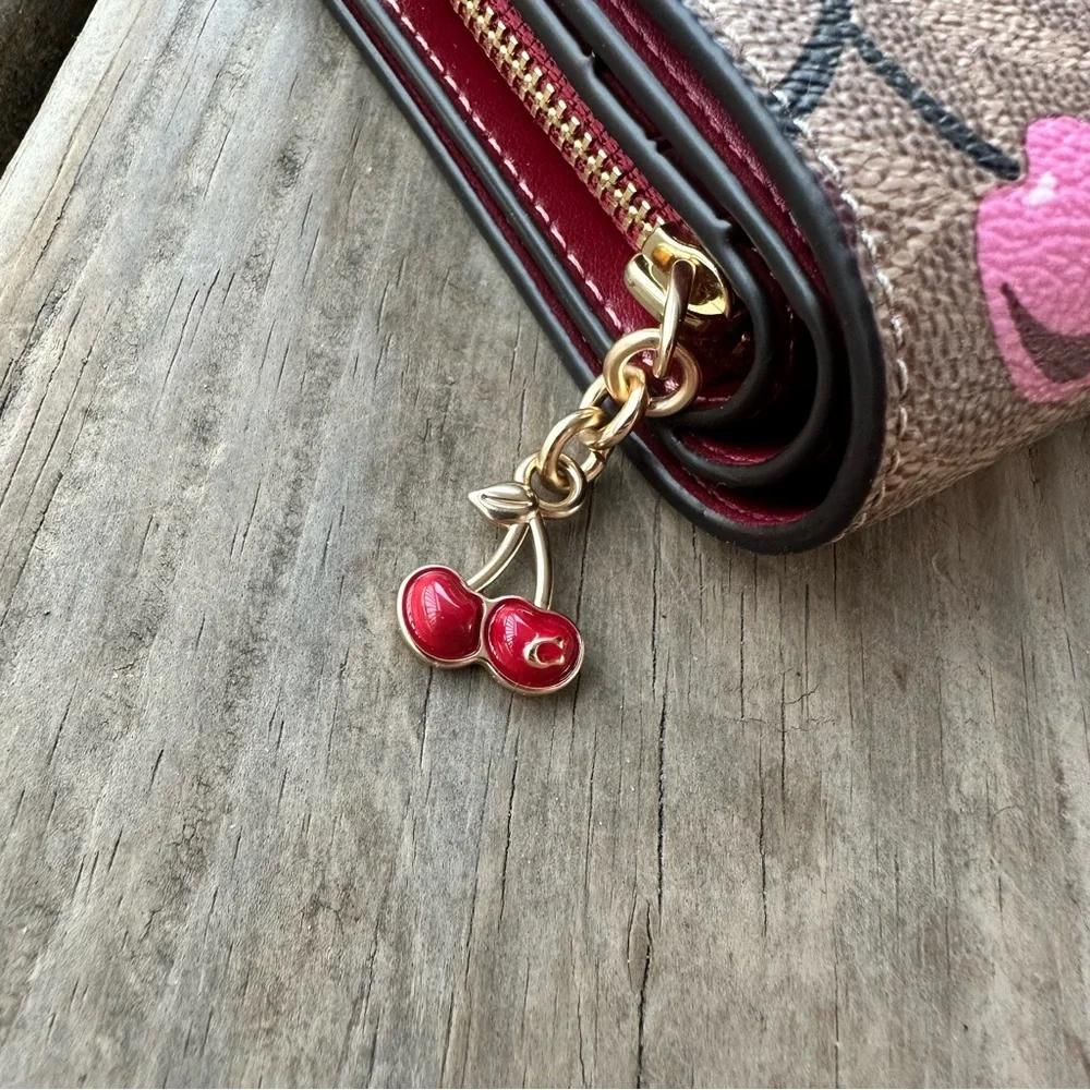 Coach Snap Wallet In Signature Canvas With Cherry Print In Tan Multi Zip Fold